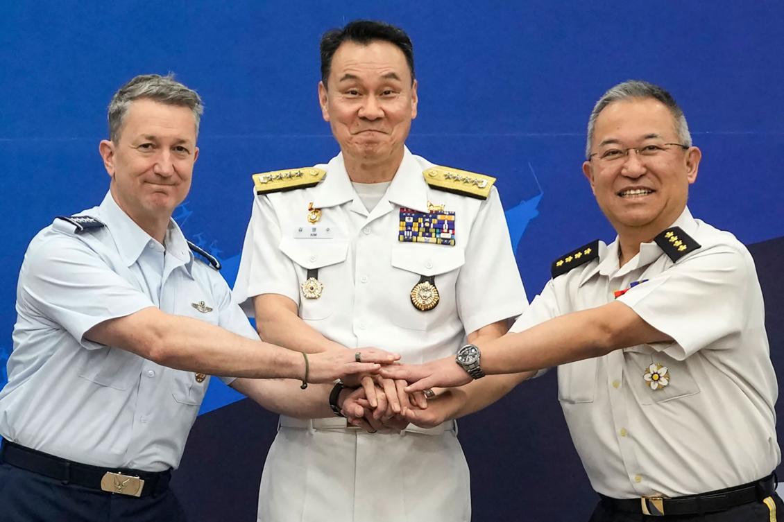 From right: Japan’s General Yoshihide Yoshida, South Korea’s Admiral Kim Myung-soo, and the US’s Gen. Dan Caine during the Trilateral Chiefs of Defense meeting in Seoul on July 11, 2025. (AFP)