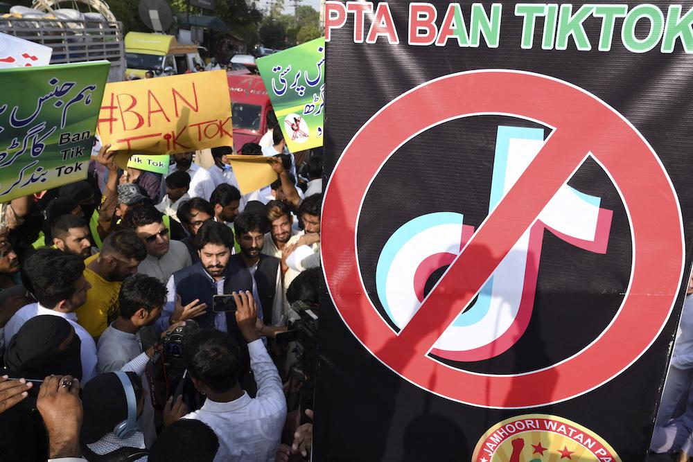 Activists protest to demand the ban of TikTok social media in Lahore on June 18, 2021. (AFP file photo)