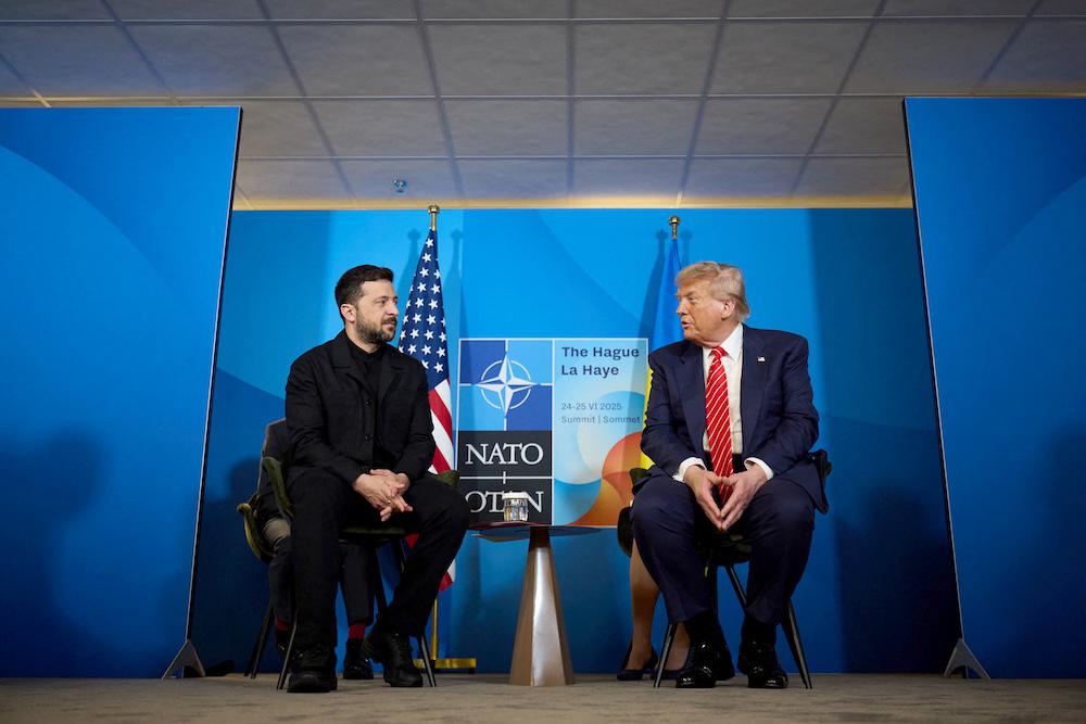 Ukraine’s President Volodymyr Zelensky meets with US President Donald Trump on the sideline of the NATO summit in The Hague on June 25, 2025. (Ukrainian Presidential Press Service /AFP)