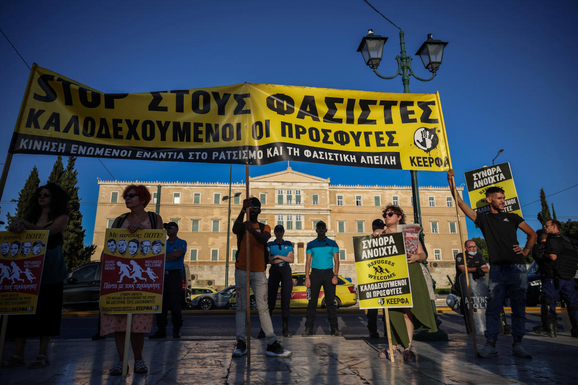 Human rights activists protest in front of the Greek parliament ahead of the vote on legislation which would temporarily halt the asylum process for North African migrant on July 10, 2025. (Reuters)