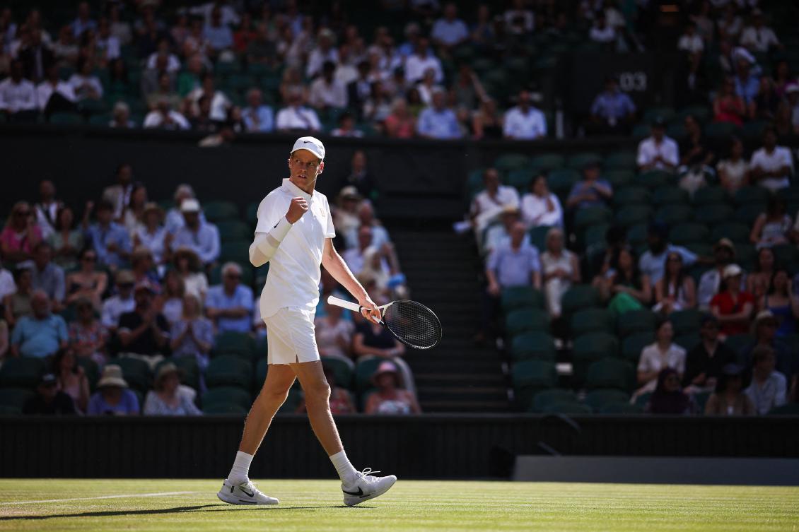 Jannik Sinner, above, who has won three majors, said Carlos Alcaraz was the favorite to win a third straight title at the All England Club. (AFP)