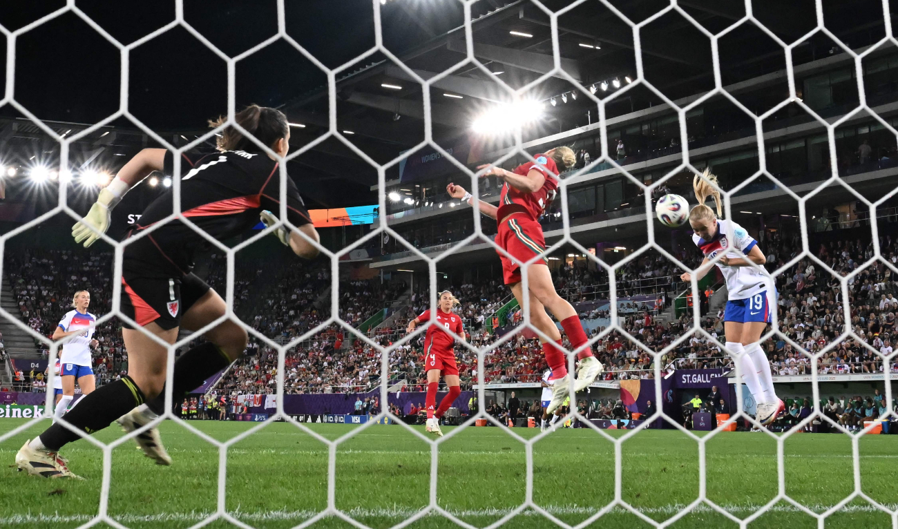 England’s forward Agnes Beever-Jones heads the ball to score the sixth goal of the match during the UEFA Women’s Euro 2025 Group D football match between England and Wales at the Arena St.Gallen in St. Gallen on Sunday. England beat Wales 6-1. (AFP)