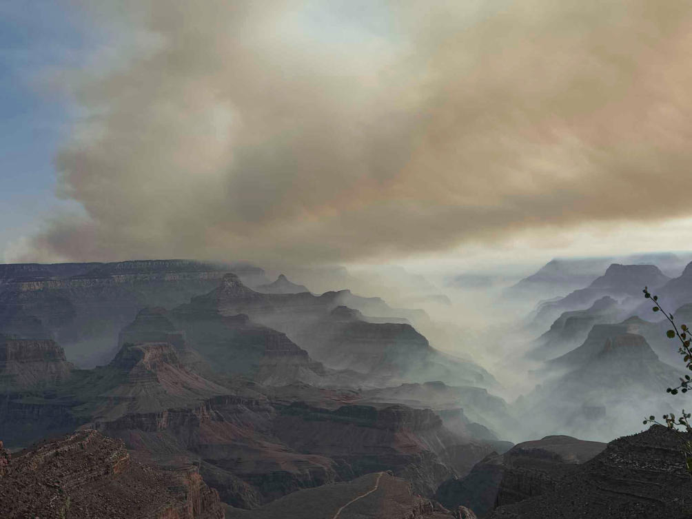 This photo provided by Caren Carney shows the family's view of fires over the Grand Canyon after they had to evacuate Grand Canyon Lodge, a historic lodge on the North Rim, in northern Arizona, Thursday, July 10, 2025. (AP)