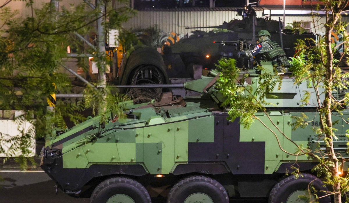 Soldiers riding a CM-34 Clouded Leopard, officially Taiwan Infantry Fighting Vehicle (TIFV), take part in the annual Han Kuang military exercises in Taipei on July 15, 2025. (AFP)