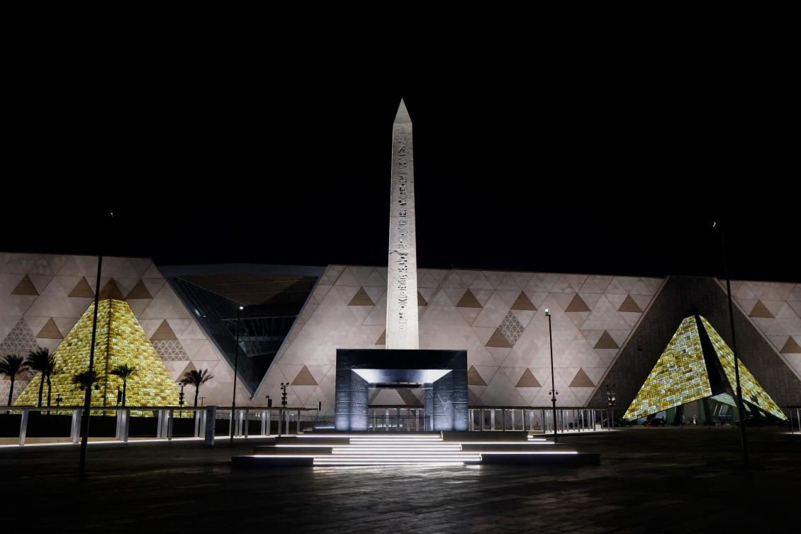 The Obelisk of Ramses II is pictured before the facade and entrance of the new Grand Egyptian Museum in Giza near Cairo late on April 6, 2025. (AFP)