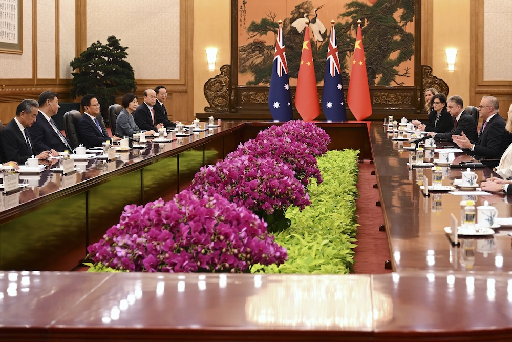 Australian Prime Minister Anthony Albanese, right, talks to China’s President Xi Jinping, second left, in the Great Hall of the People in Beijing on July 15, 2025. (AAP Image via AP)