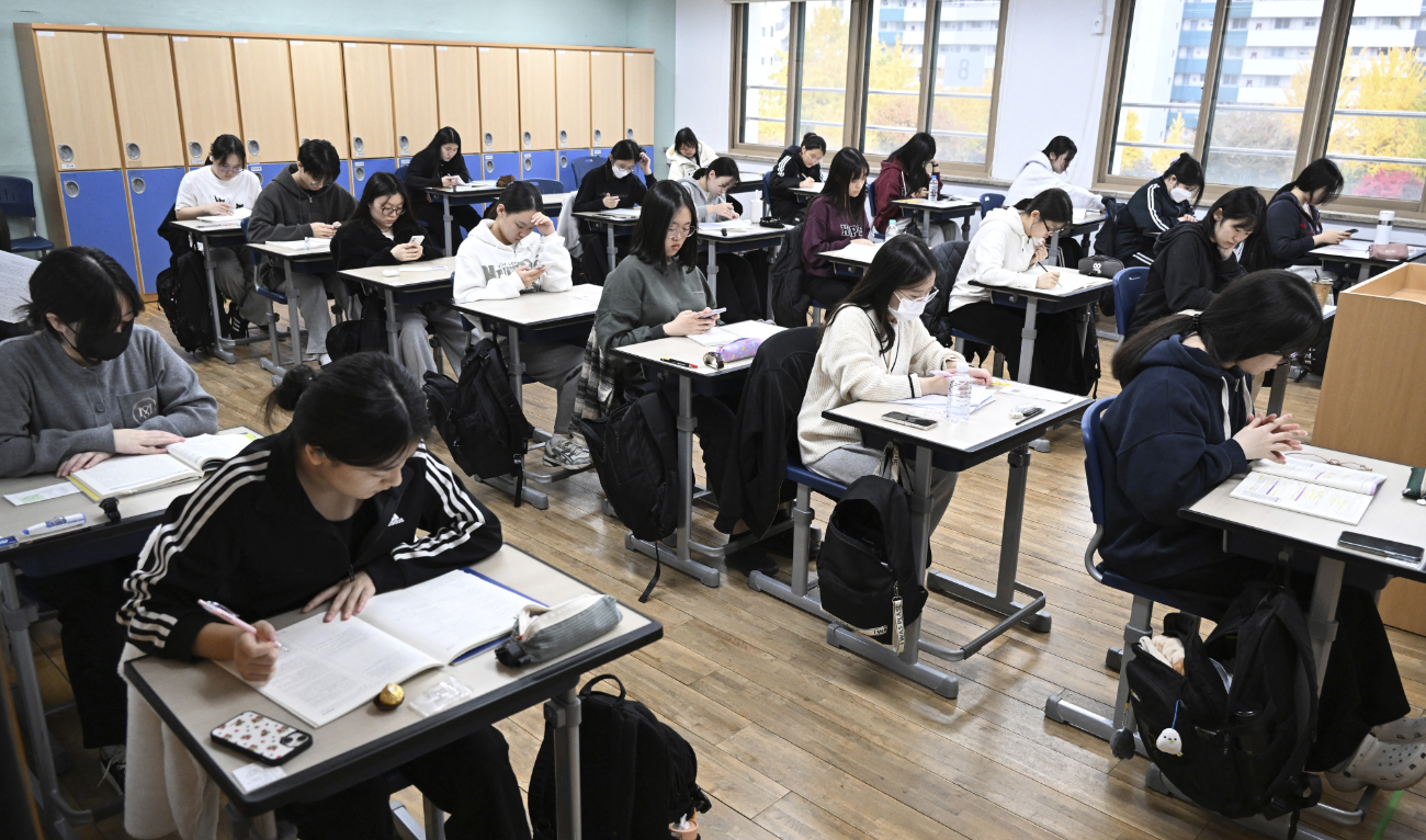 The country is known for placing extreme emphasis on academic achievement — with its annual college entrance exam forcing airplanes to be grounded during English listening tests. (AFP/File)