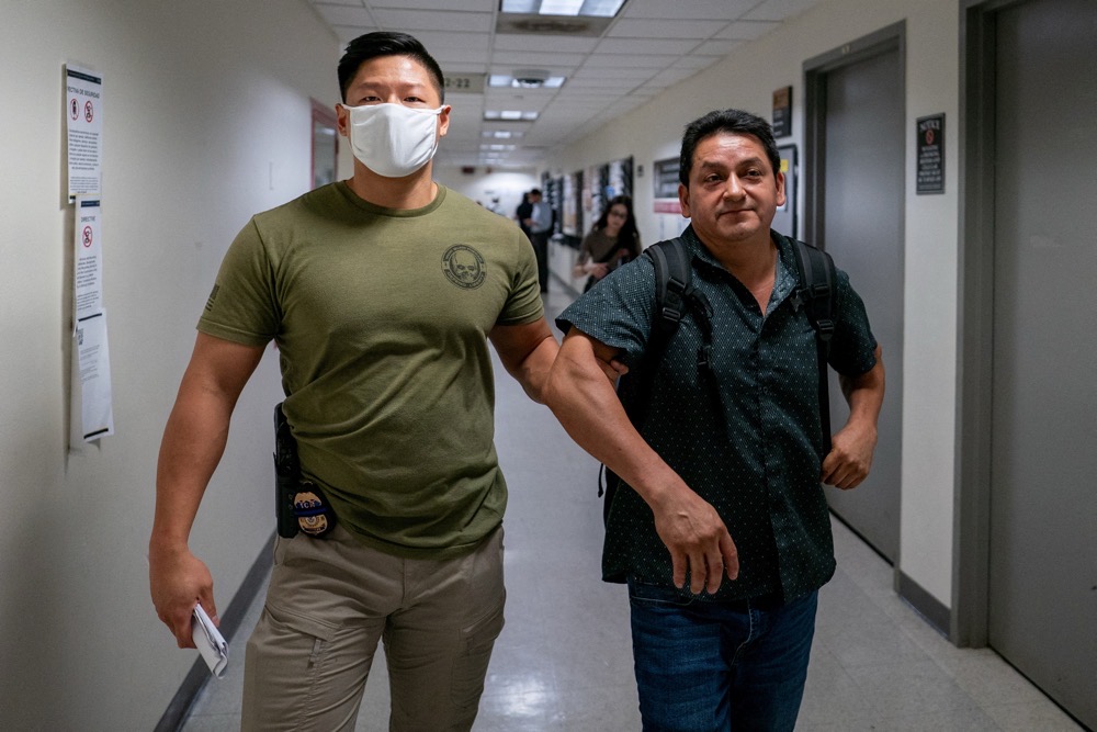 A migrant is detained by federal immigration officers at U.S. immigration court in Manhattan, in New York City, U.S., July 15, 2025. (Reuters)