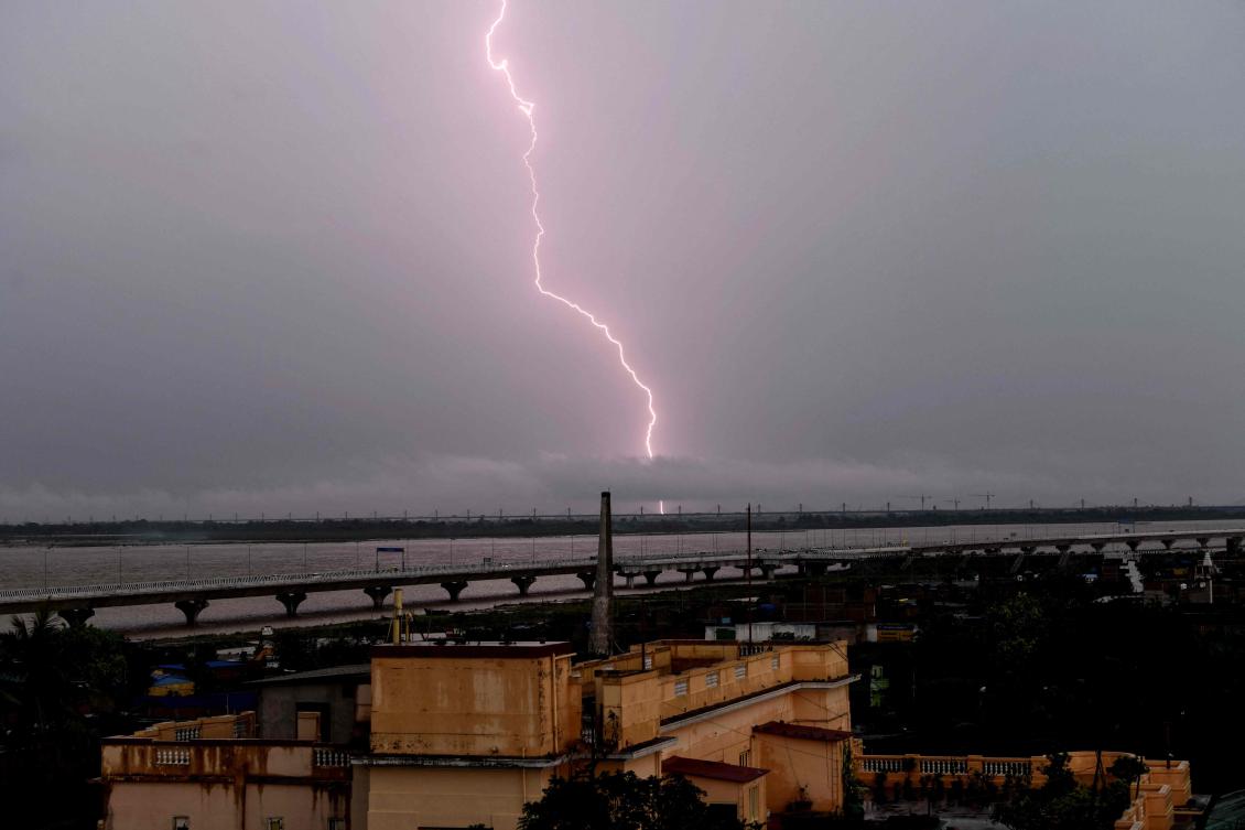 Lightning strikes over the grey sky during monsoons in Patna on July 16, 2025. (AFP)