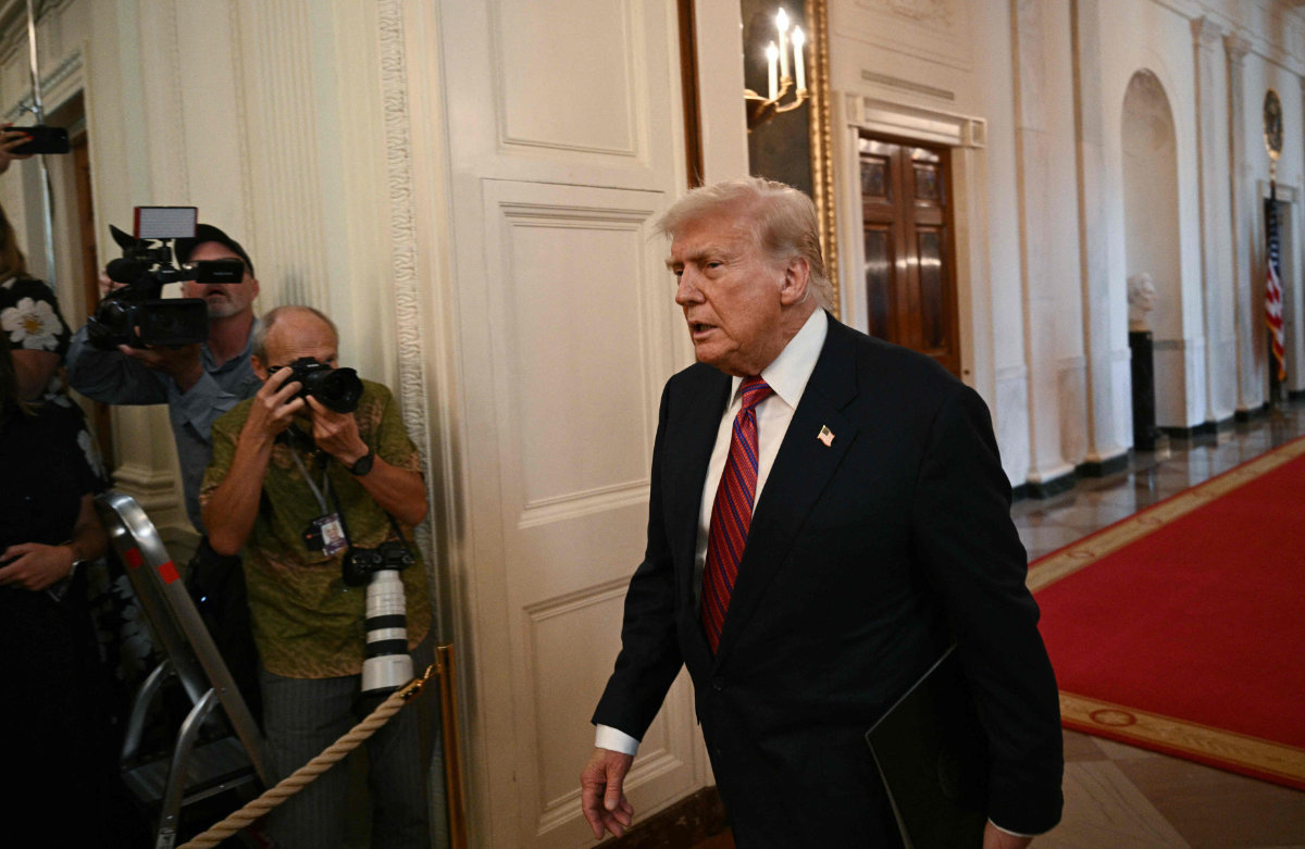 US President Donald Trump's long shadow has extended far beyond Washington’s institutions, pushing into private realms his predecessors avoided. (AFP)