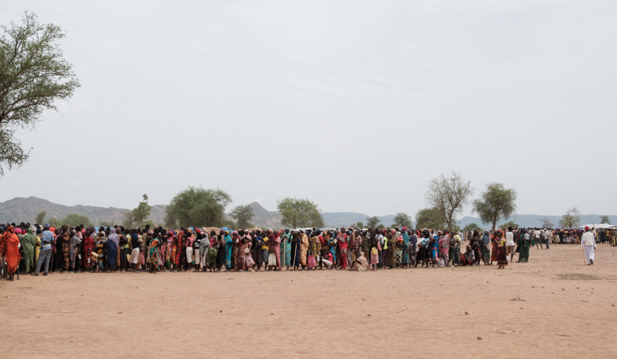 People line up to register for a potential food aid delivery at a camp for internally displaced persons (IDP) in Agari, South Kordofan, on June 17, 2024. (AFP)