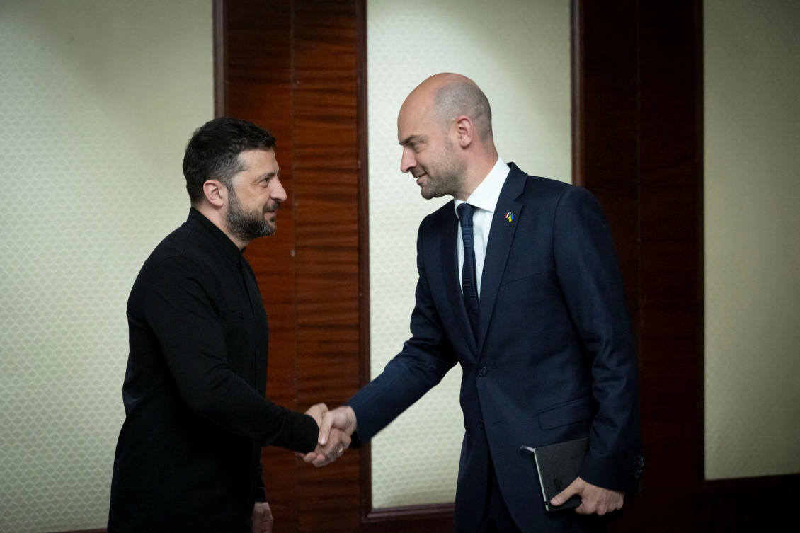Ukraine’s President Volodymyr Zelensky and French FM Jean-Noel Barrot shake hands before their meeting, amid Russia’s attack on Ukraine, in Kyiv, Ukraine, July 21, 2025. (Reuters)