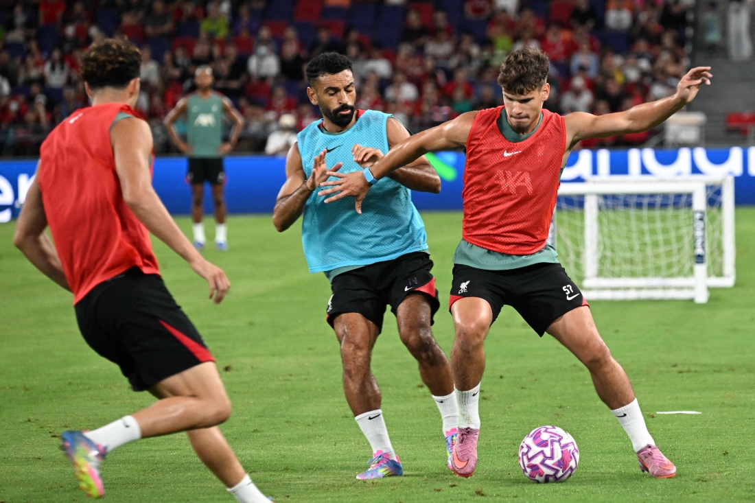 Liverpool’s Milos Kerkez (R) and Mohamed Salah (C) take part in a training session at the Kai Tak Stadium in Hong Kong on July Thursday, ahead of a friendly exhibition football match against AC Milan which will be played on Saturday. (AFP)