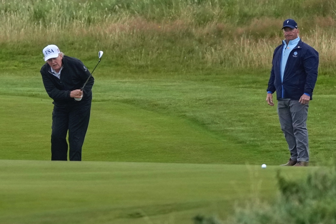 Trump plays golf in Scotland while protesters take to the streets and decry his visit