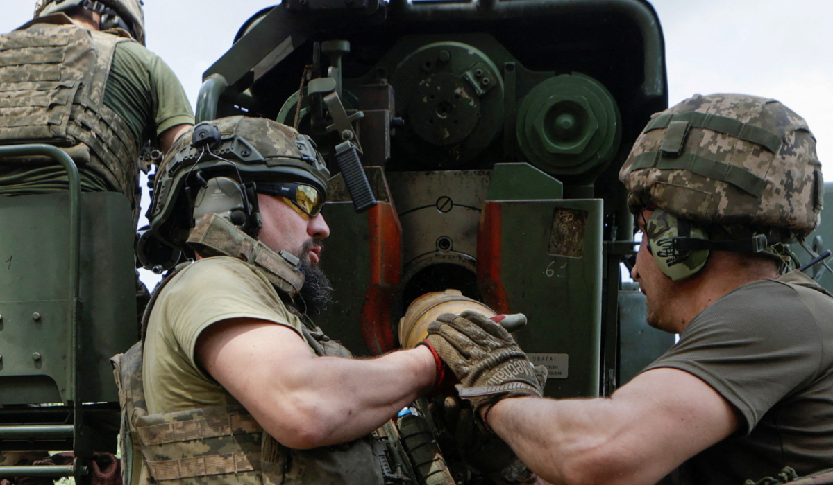 Service members of the 48th Separate Artillery Brigade load a shell into a 2S22 Bohdana self-propelled howitzer before firing towards Russian troops near a front line, amid Russia's attack on Ukraine, in Kharkiv region, Ukraine July 27, 2025. (REUTERS)