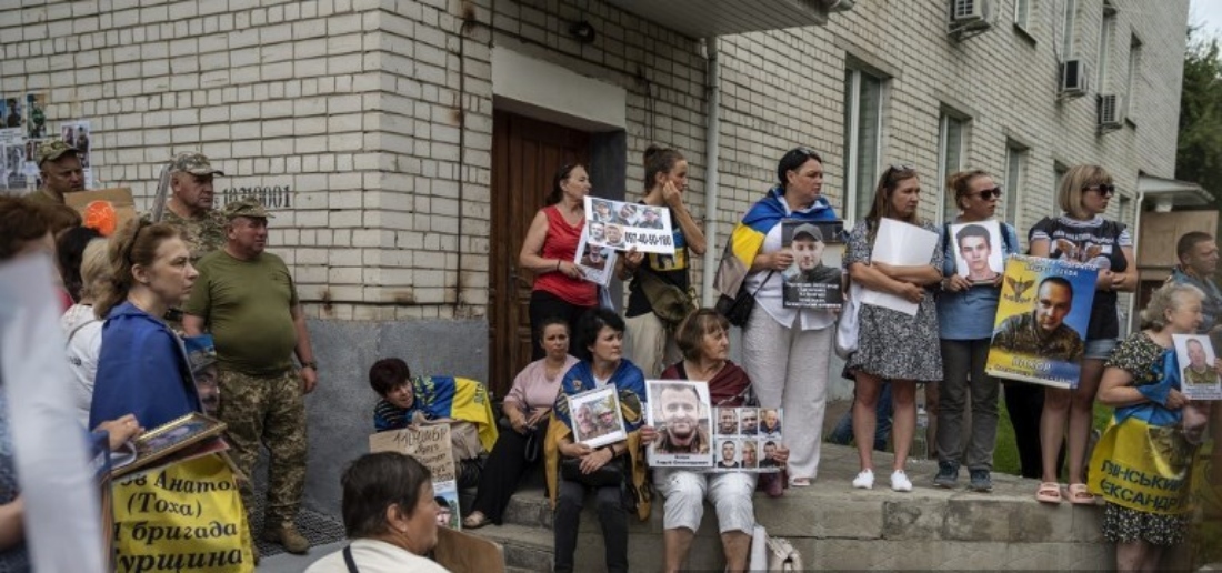 Relatives and loved ones of Ukrainian military personnel of the Armed Forces wait for them to return after the prisoner swap deal in Chernihiv region of Ukraine. (AFP)