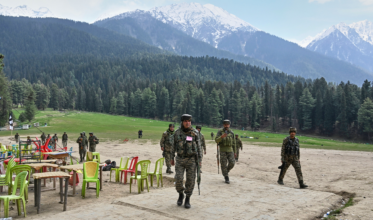 Indian security officers inspect the site where militants indiscriminately opened fired on tourists the previous day, in Pahalgam, Indian controlled Kashmir, on April 23, 2025. (AP/File)