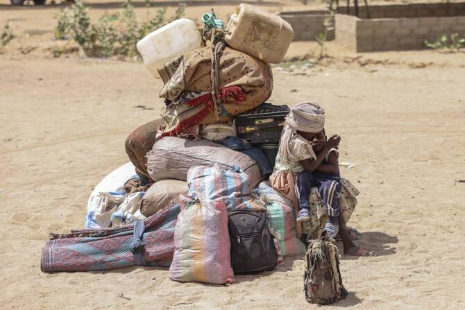 Toting large suitcases and bags of belongings, the Sudanese families crowding into Cairo's main railway station hoped to be returning to relative stability after fleeing Sudan's civil war. (AP/File)