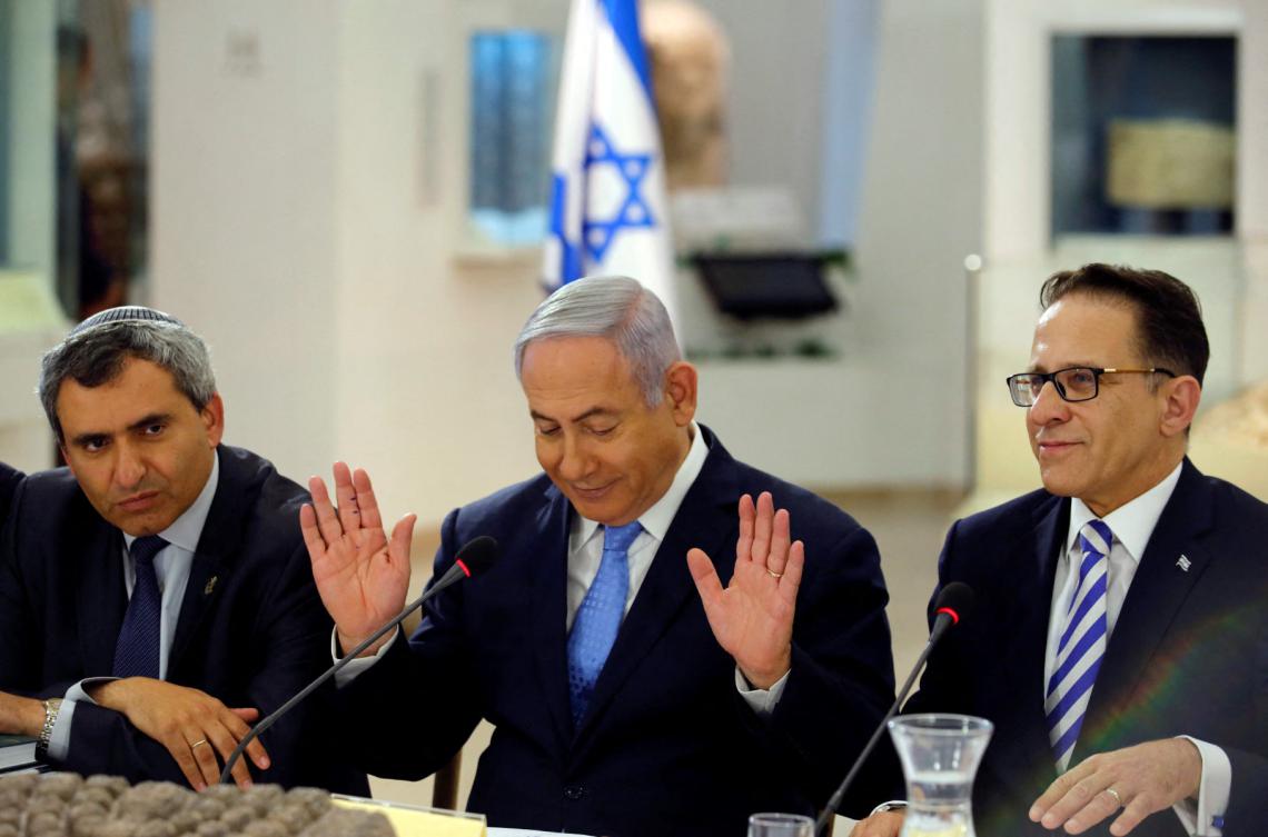 Security cabinet member Zeev Elkin (L) told public broadcaster Kan that Israel may give Hamas an ultimatum to reach a deal before further expanding its military actions. (File/AFP)