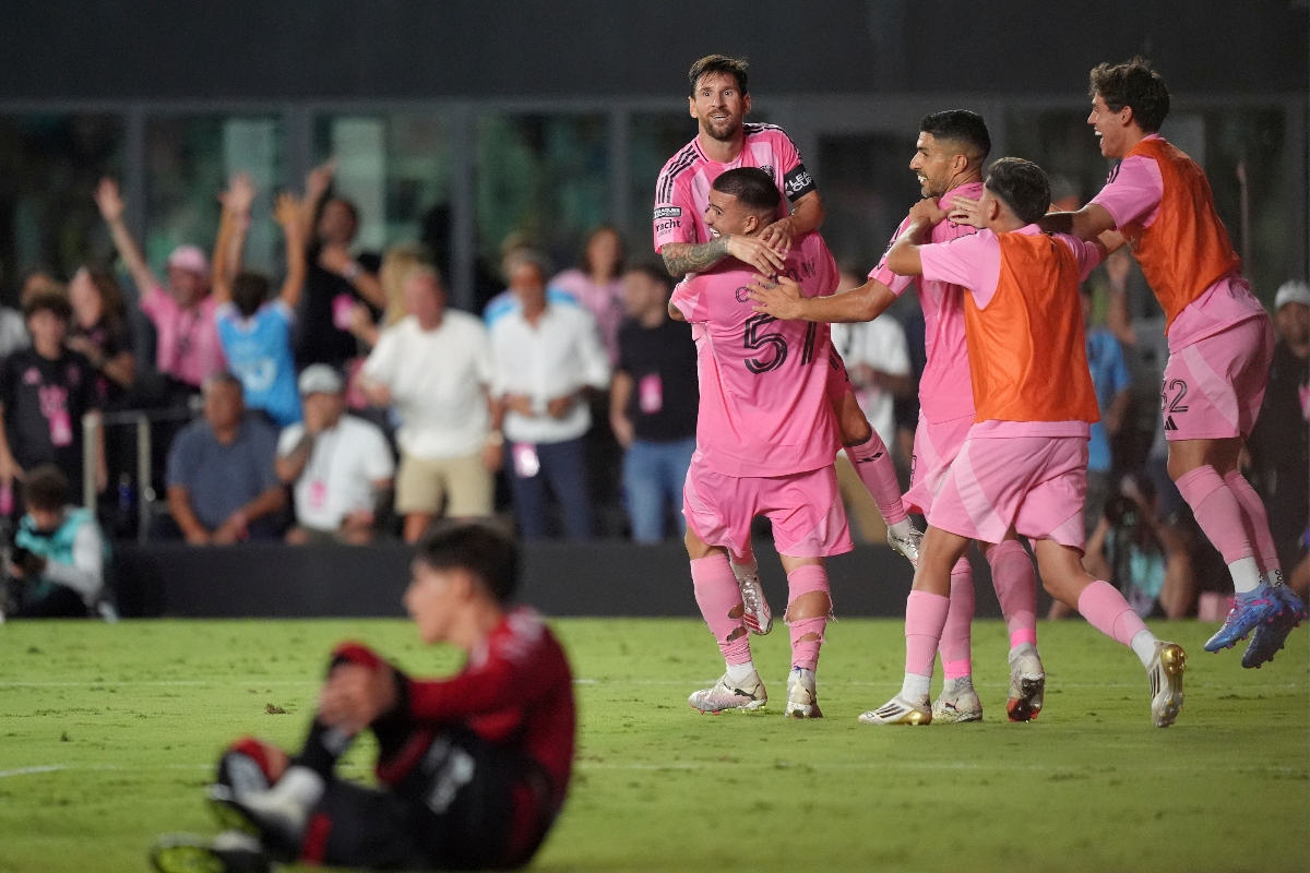 Inter Miami defender Marcelo Weigandt lifts forward Lionel Messi as teammates celebrate after Weigandt scored his side’s second goal during stoppage time at the end of a Leagues Cup group stage match Wednesday in Fort Lauderdale, Fla. (AP)