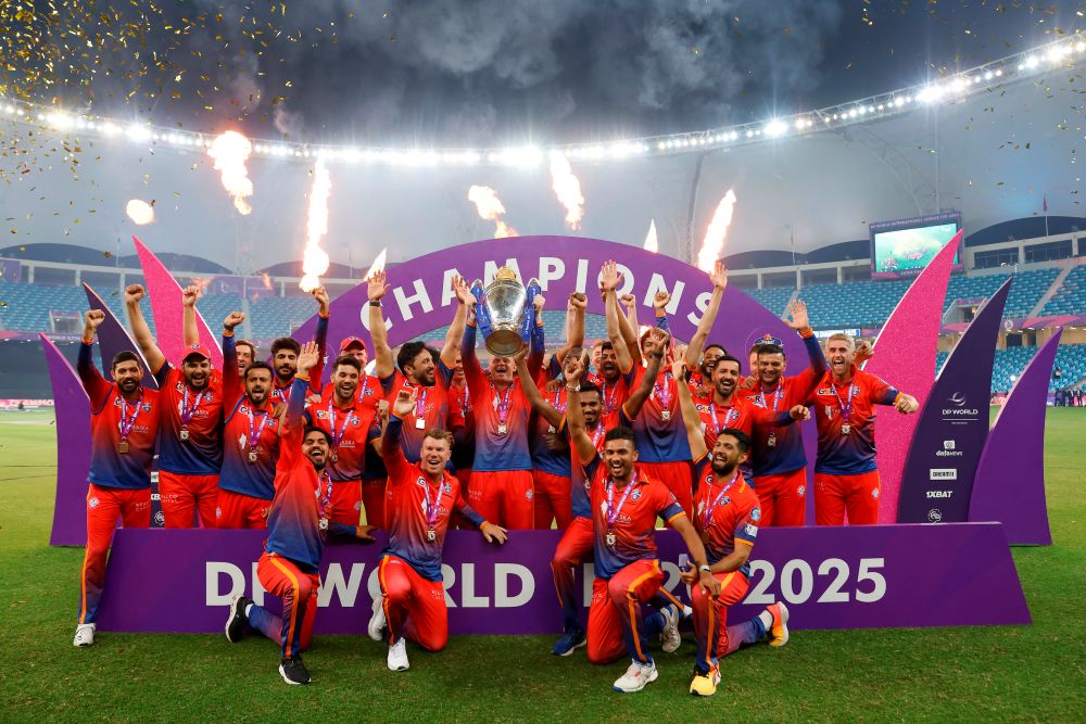 Dubai Capitals players celebrate with the trophy after victory, over the Desert Vipers, in the final of the DP World ILT20 Season 3 at Dubai International Stadium. (Deepak Malik/CREIMAS/ILT20)