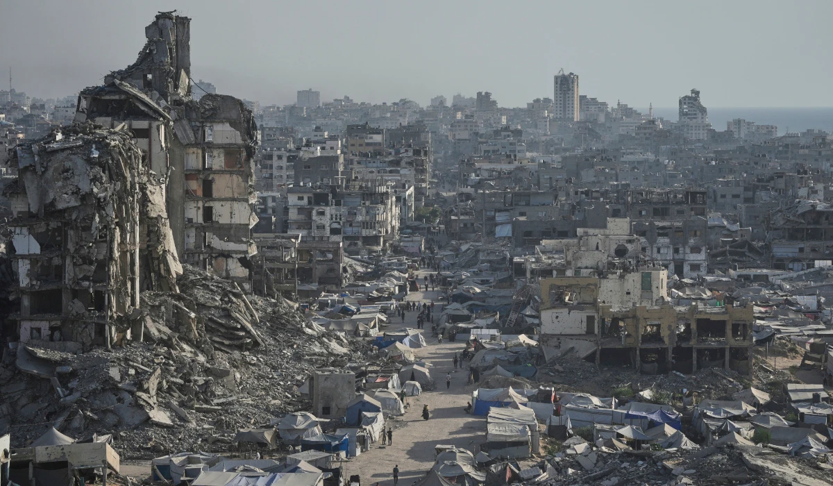 Tents sheltering displaced Palestinians are seen amid war-damaged infrastructure in Gaza City, July 17, 2025. (AP)