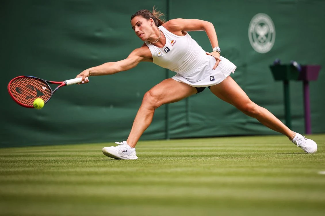 US player Emma Navarro returns the ball to Czech Republic’s Petra Kvitova during their women’s singles first round tennis match on the second day of the 2025 Wimbledon Championships at The All England Lawn Tennis and Croquet Club in Wimbledon, on July 1, 2025. (AFP)