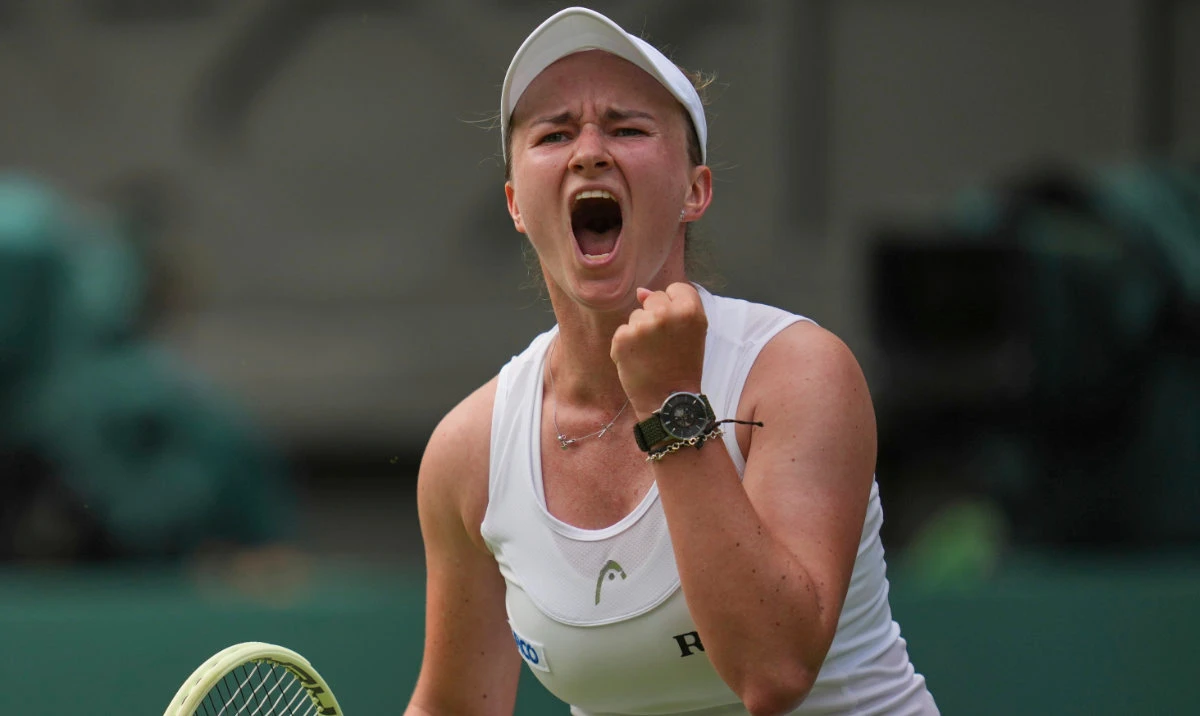 Barbora Krejcikova of Czech Republic celebrates after beating Alexandra Eala of the Philippines in their first round women's singles match at the Wimbledon Tennis Championships in London, Tuesday, July 1, 2025. (AP)
