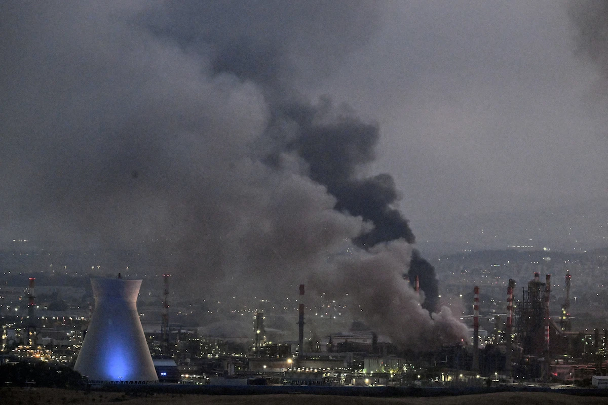 Smoke rises from a site in Haifa, Israel, after a missile attack by Iran during their 12-day war last month. (Reuters)