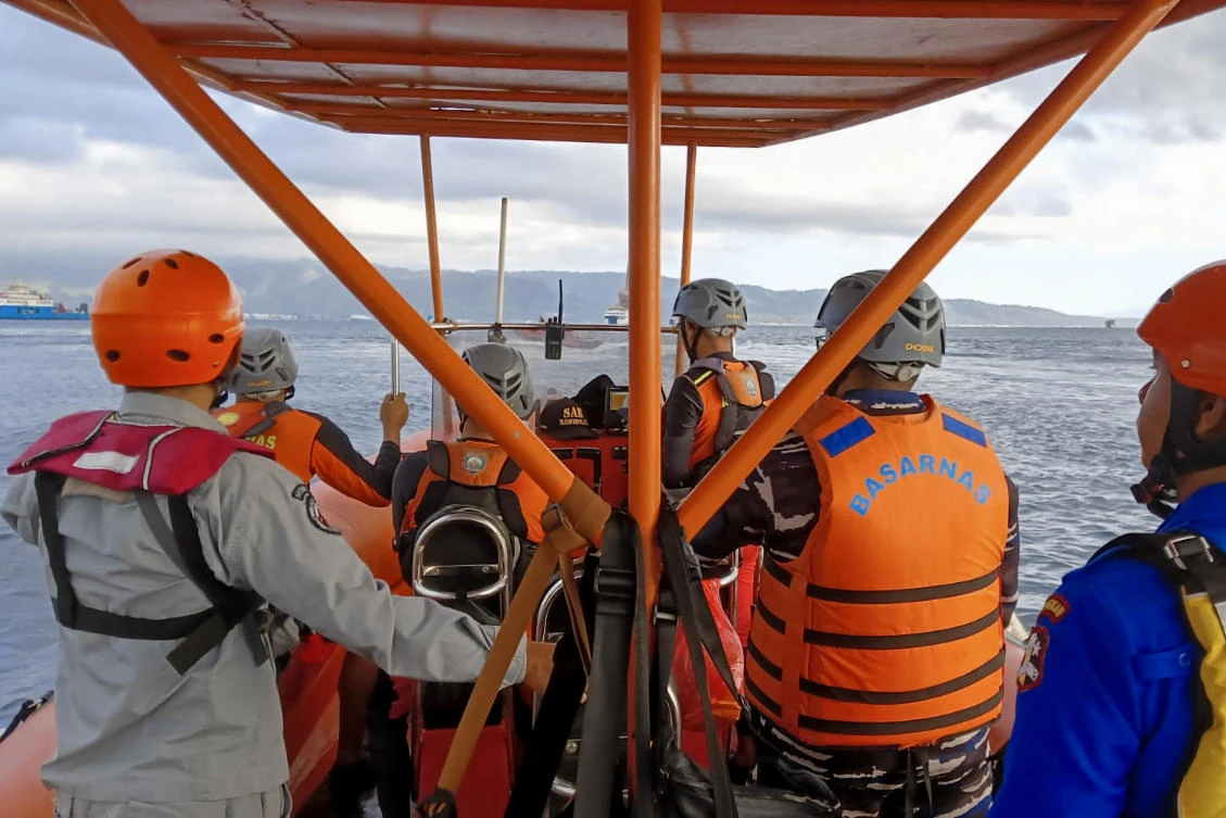 At least six people were dead and dozens unaccounted after a ferry sank in rough seas on its way to the Indonesian resort island Bali. (AFP PHOTO / INDONESIA’S NATIONAL SEARCH AND RESCUE AGENCY (BASARNAS))