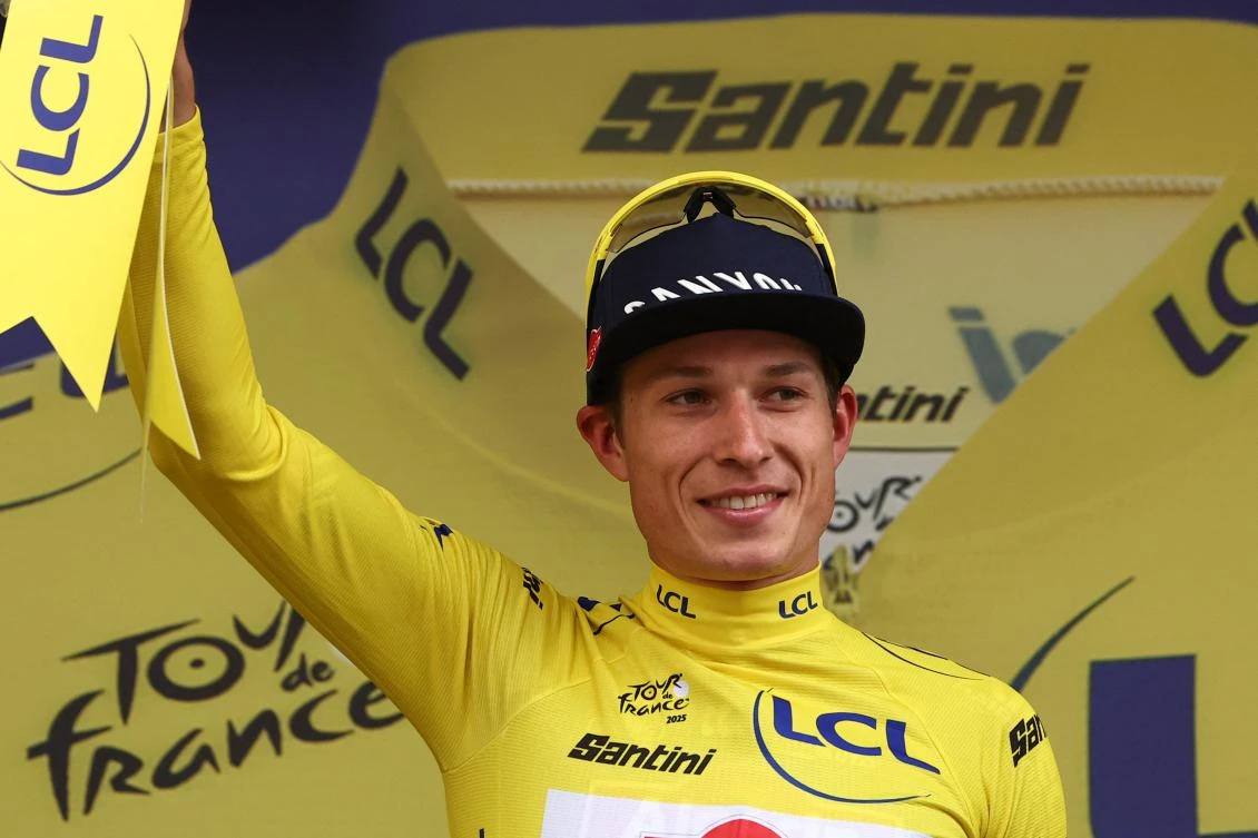 Alpecin — Deceuninck team’s Belgian rider Jasper Philipsen celebrates on the podium with the overall leader’s yellow jersey after the 1st stage of the 112th edition of the Tour de France cycling race, 184.9 km starting and finishing in Lille Metropole, on July 5, 2025. (AFP)