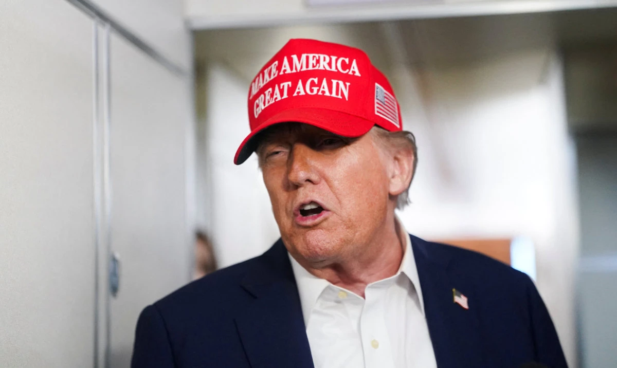 US President Donald Trump speaks to members of the media on board Air Force One on the way to New Jersey, US, July 4, 2025. (Reuters)