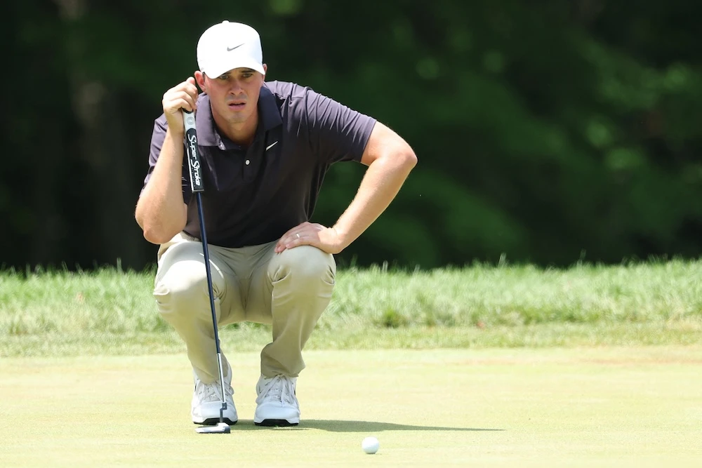 Davis Thompson of the US lines up a putt on the 12th green during the third round of the John Deere Classic 2025 at TPC Deere Run on Saturday in Silvis, Illinois. (Getty Images via AFP)