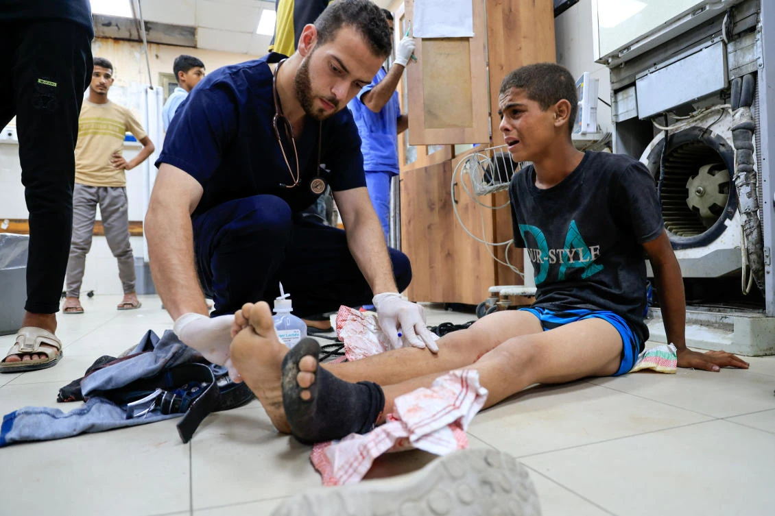 A Palestinian, wounded by Israeli fire while seeking aid on Friday, receives treatment at Nasser Hospital in Khan Younis, southern Gaza Strip, July 4 2025. (Reuters)