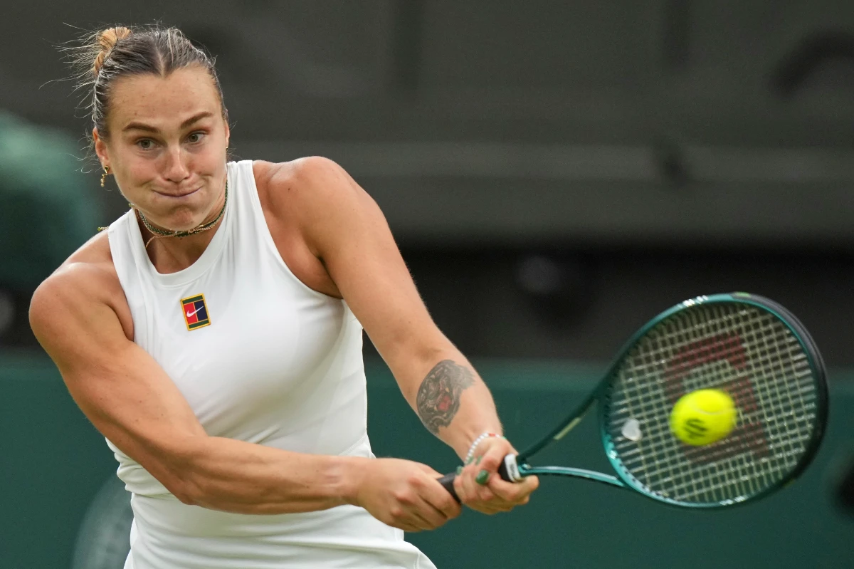 Aryna Sabalenka of Belarus returns to Belgium's Elise Mertens during a fourth round women's singles match at the Wimbledon Tennis Championships in London on July 6, 2025. (AP)