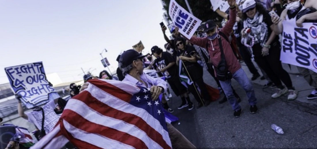 Demonstrators gather in front of the Metropolitan Detention Center in protest of the Trump administration's ICE raids in Los Angeles, US. (AFP)