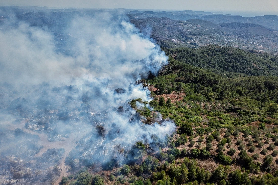 Smoke rises as fires continue to rage in Latakia, Syria. (AP)
