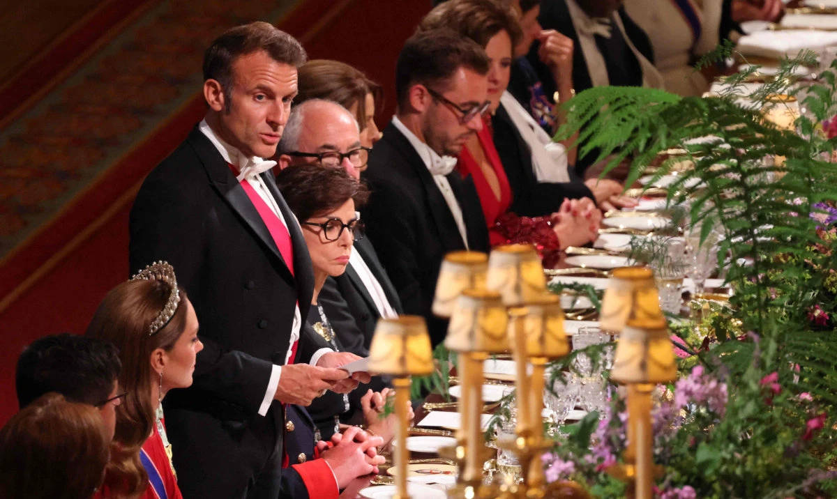 France's President Emmanuel Macron (C) delivers a speech during a State Banquet at Windsor Castle, west of London, on July 8, 2025, on the first day of a three-day state visit of French President to Britain. (AFP)