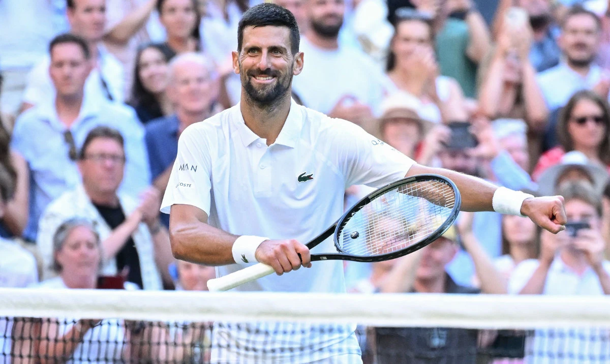 Serbia's Novak Djokovic celebrates after victory Italy's Flavio Cobolli during their men's singles quarter-final tennis match on the tenth day of the 2025 Wimbledon Championships at The All England Lawn Tennis and Croquet Club in Wimbledon, southwest London, on July 9, 2025. (AFP)