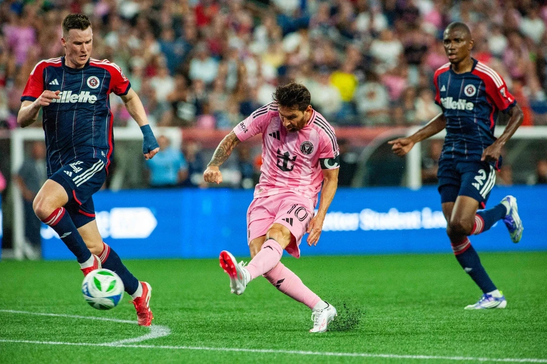 Inter Miami’s Argentine forward Lionel Messi kicks to score a second goal during the Major League Soccer (MLS) regular season match between New England Revolution and Inter Miami CF at Gillette Stadium in Foxborough, Massachusetts, on Thursday. (AFP)