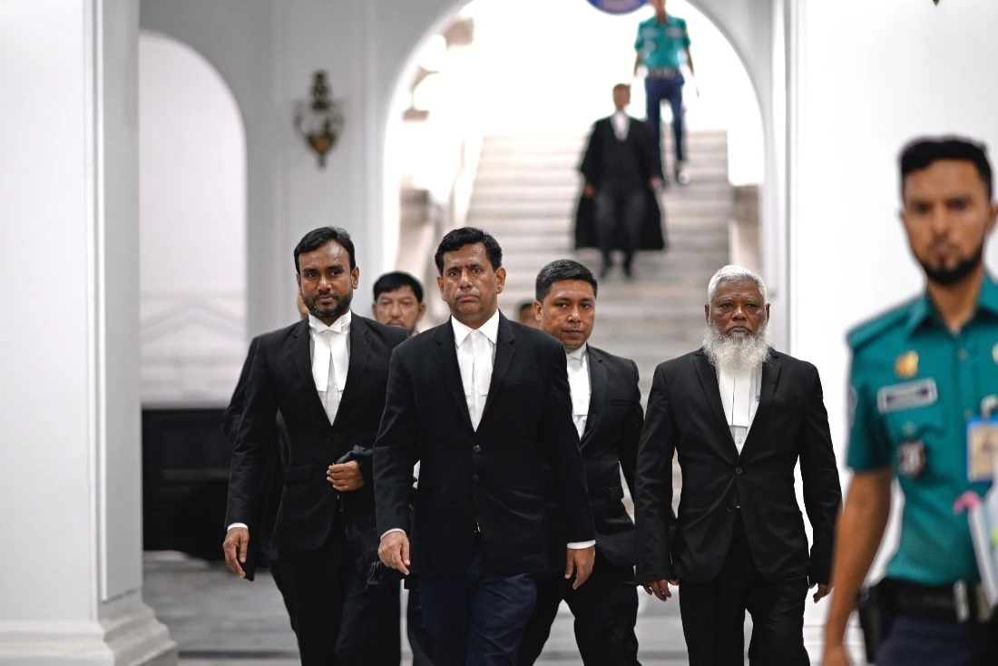 Chief Prosecutor Mohammad Tajul Islam arrives to talk to the media at the International Crimes Tribunal in Dhaka, Bangladesh. We (AP)