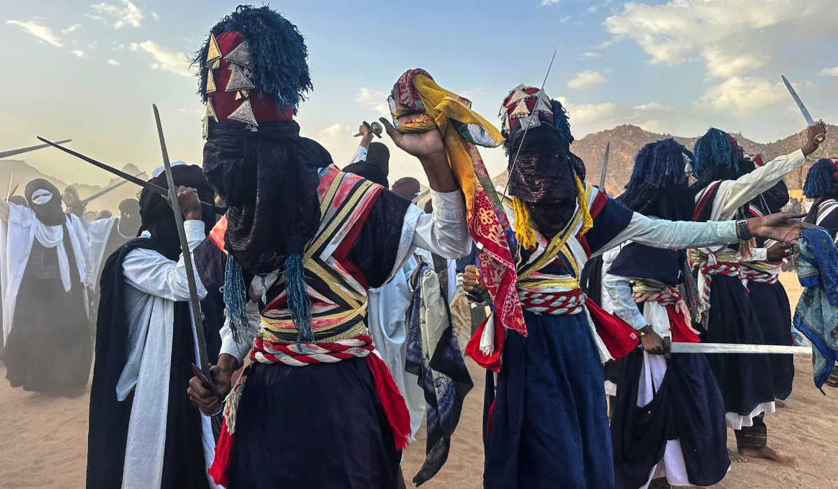 Dancers perform on the last day of the Sebeiba festival in Djanet, a southeastern Algerian oasis town in the Sahara desert. (AP)