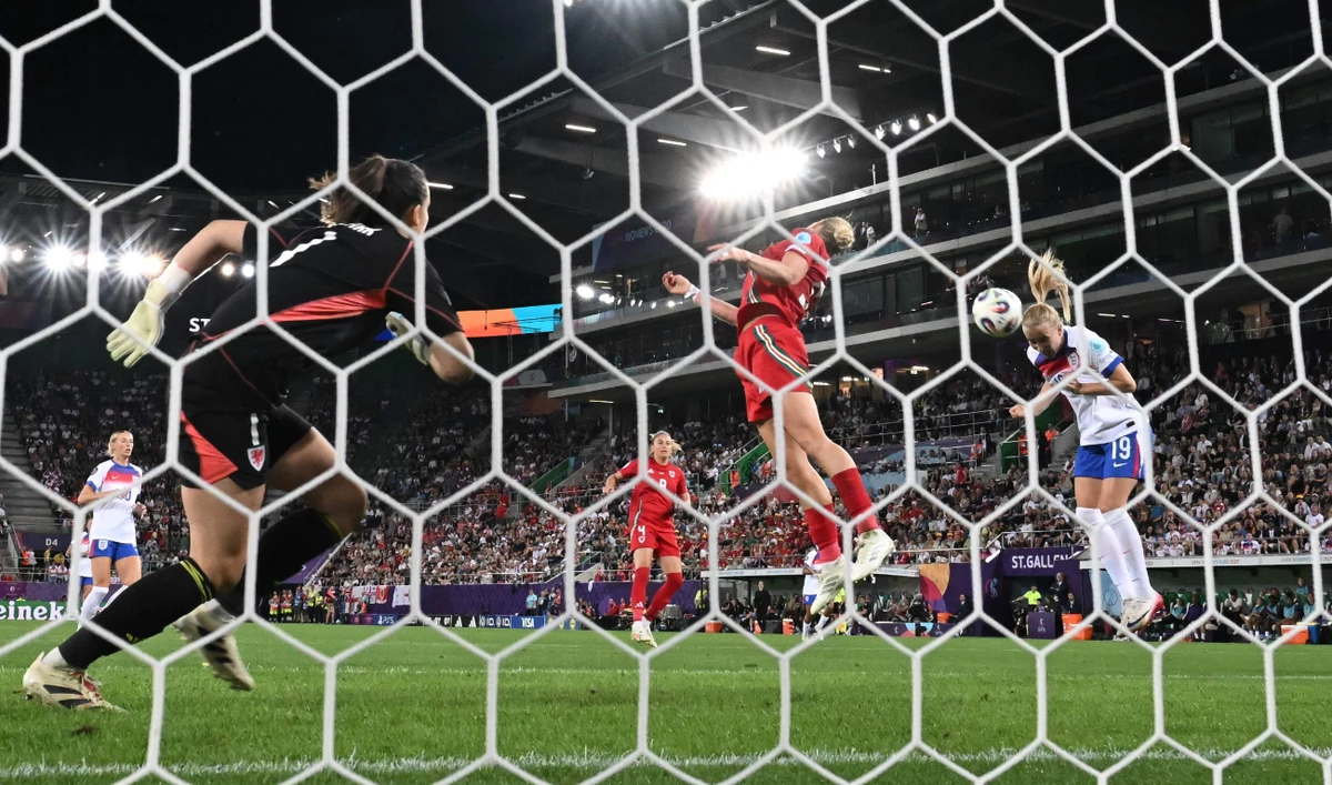 England’s forward Agnes Beever-Jones heads the ball to score the sixth goal of the match during the UEFA Women’s Euro 2025 Group D football match between England and Wales at the Arena St.Gallen in St. Gallen on Sunday. England beat Wales 6-1. (AFP)