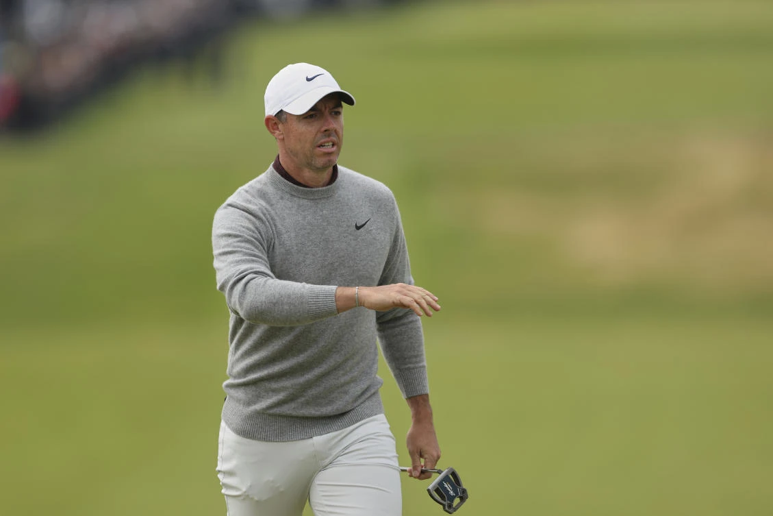 Rory McIlroy of Northern Ireland gestures as he walks on the 1st green during the first round of the British Open golf championship at the Royal Portrush Golf Club, Northern Ireland, July 17, 2025. (AP)