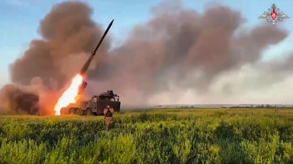 In this photo taken from video distributed by Russian Defense Ministry Press Service on July 17, 2025, a Russian self-propelled multiple rocket launcher fires towards a Ukrainian position in Ukraine. (AP)