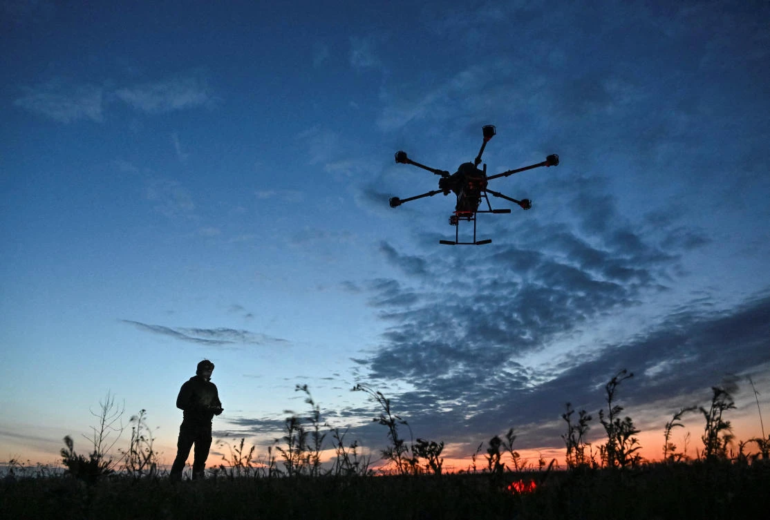 A Ukrainian serviceman launches a Vampire combat drone flying over positions of Russian troops on April 29, 2025. (Reuters)