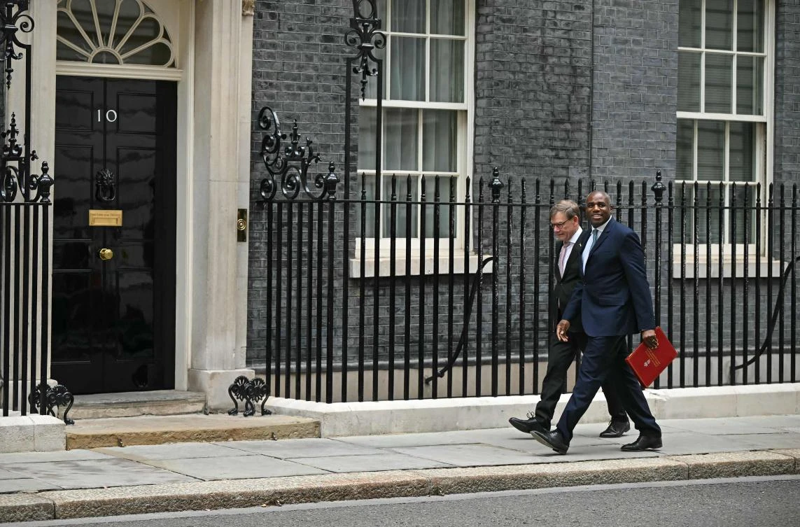 Britain’s Foreign Secretary David Lammy walks with Germany’s Foeign Minister Johann Wadephul to 10 Downing Street in London on July 17, 2025. (AFP)