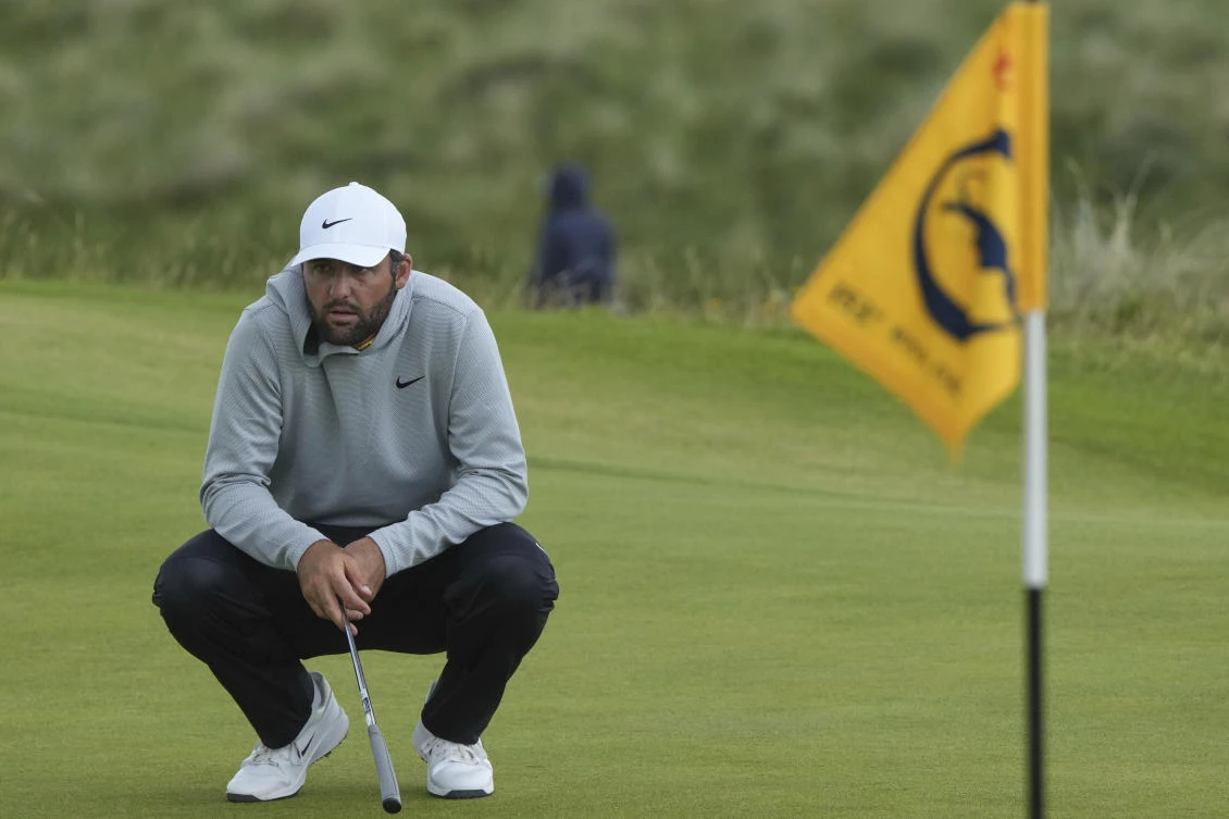 Scottie Scheffler of the United States waits to putt on the 8th green during the second round of the British Open golf championship at the Royal Portrush Golf Club, Northern Ireland, July 18, 2025. (AP)