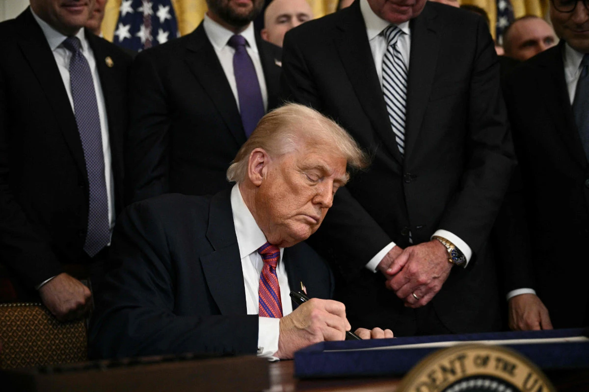 Trump signs stablecoin law as crypto industry aims for mainstream adoption