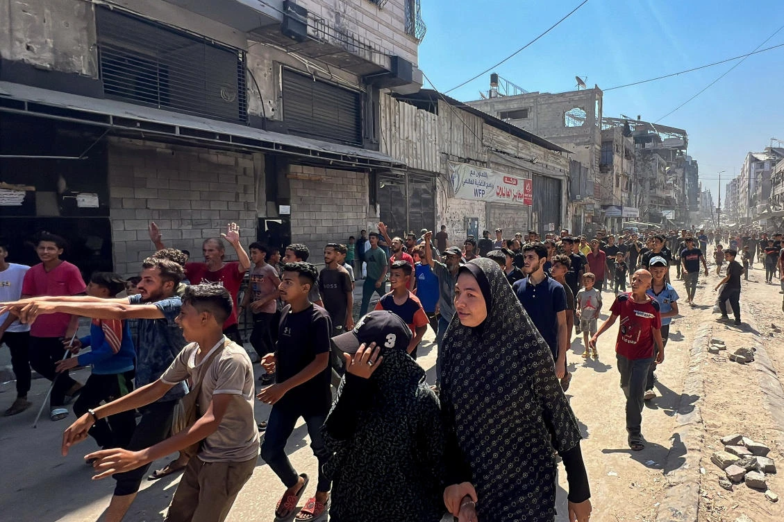 Palestinians protest against hunger and high prices, amid the Israeli blockade and offensive, in Gaza City, July 18, 2025. (Reuters)